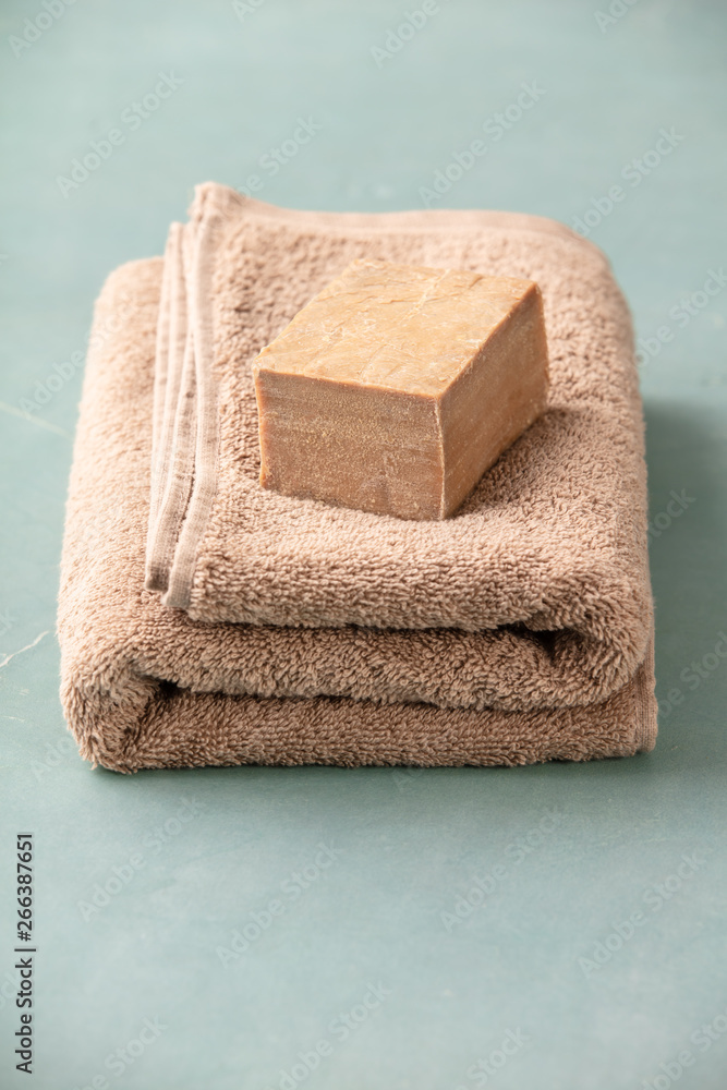 Soap and towel close up, SPA and relaxation concept