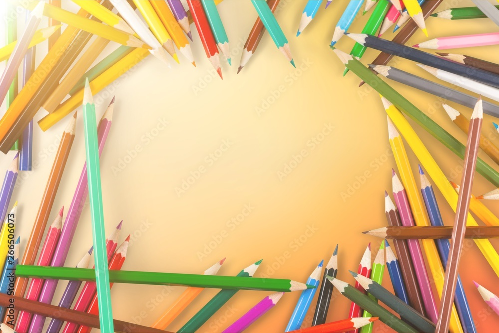 Many colored wooden pencils isolated on white