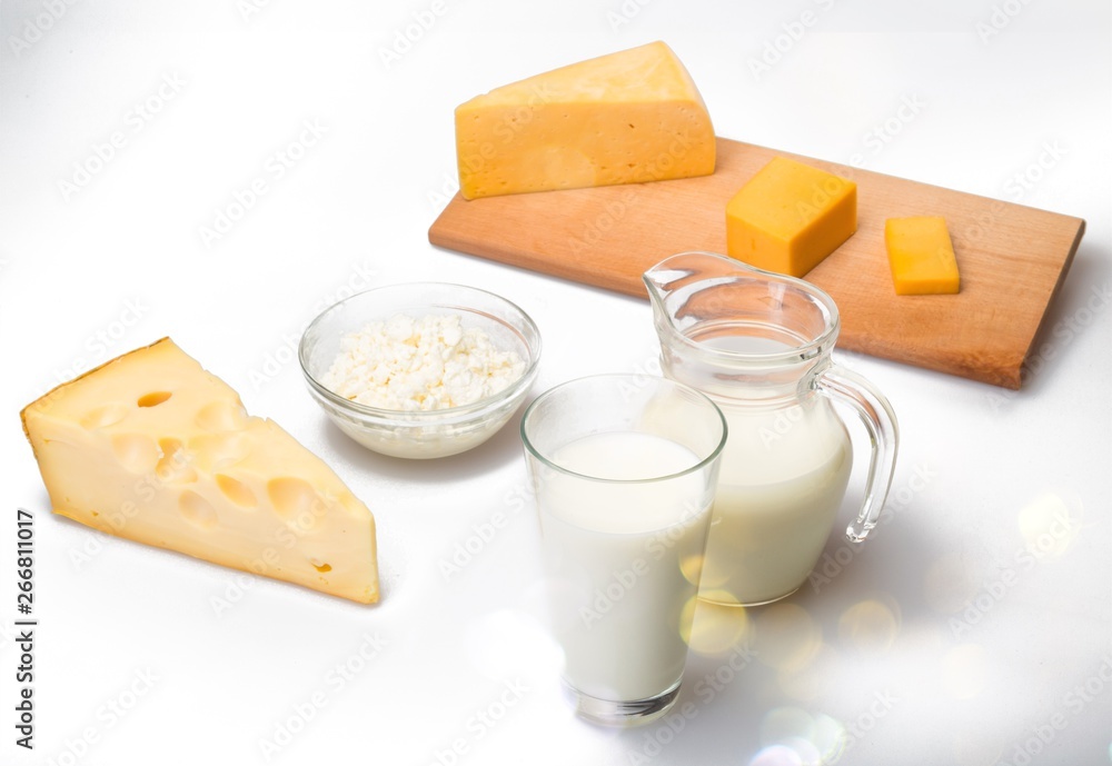 Dairy Products- Cheeses and Milk on the Grey Background