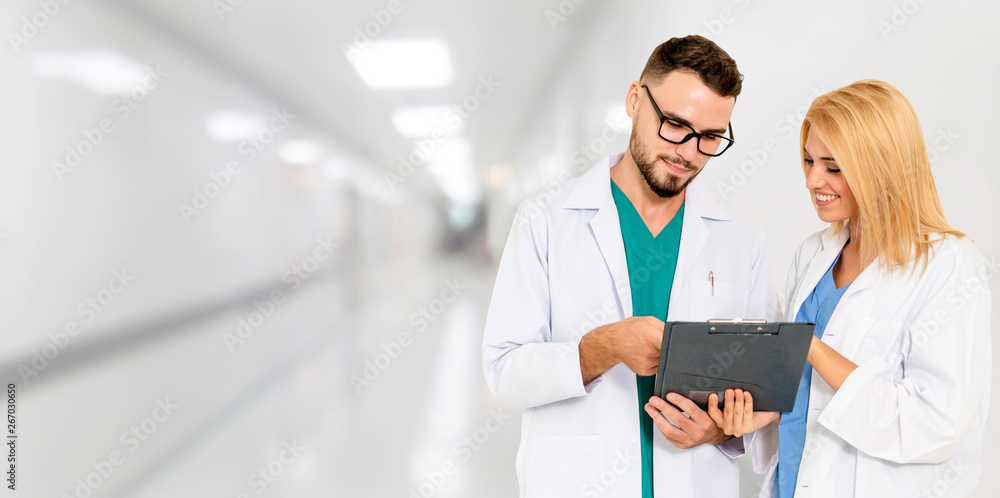 Doctor working with another doctor in the hospital. Healthcare and medical service.