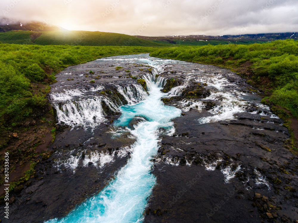 Aerial view landscape of Bruarfoss waterfall in Brekkuskogur, Iceland. Bruarfoss waterfall is the fa