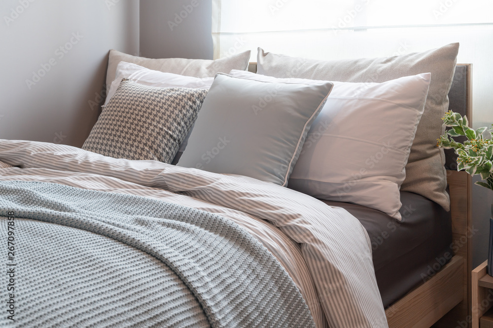 modern bedroom with set of pillows