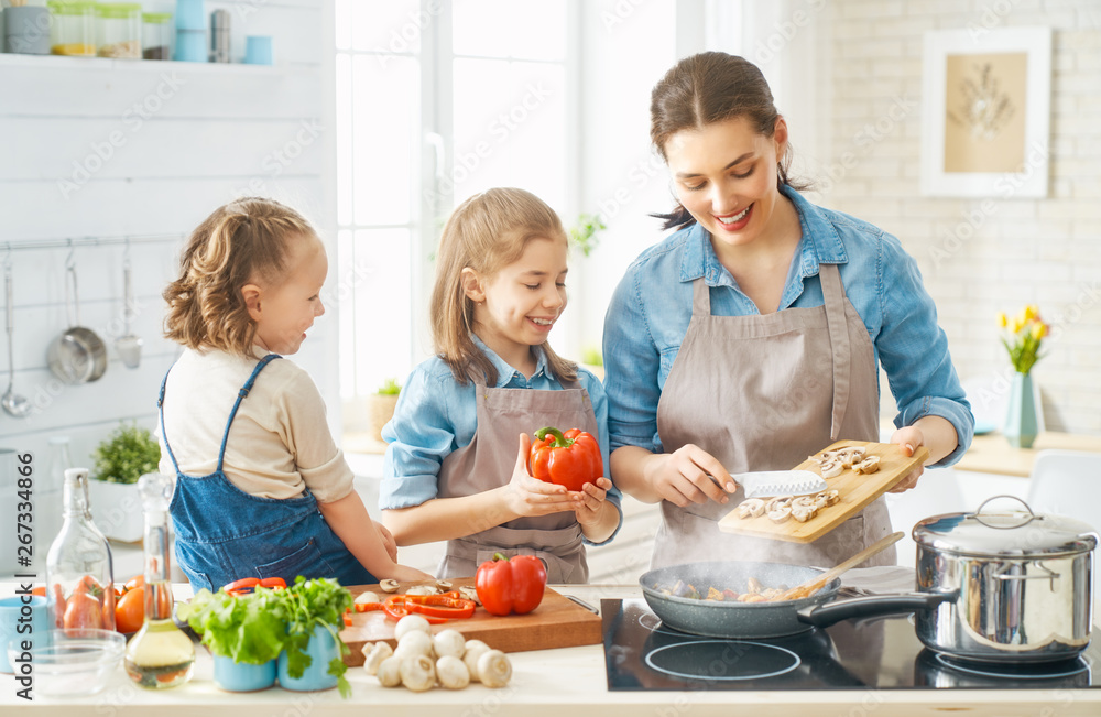 Happy family in the kitchen.