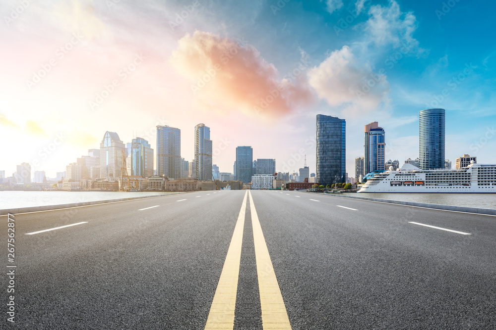 Empty highway and modern city skyline in Shanghai