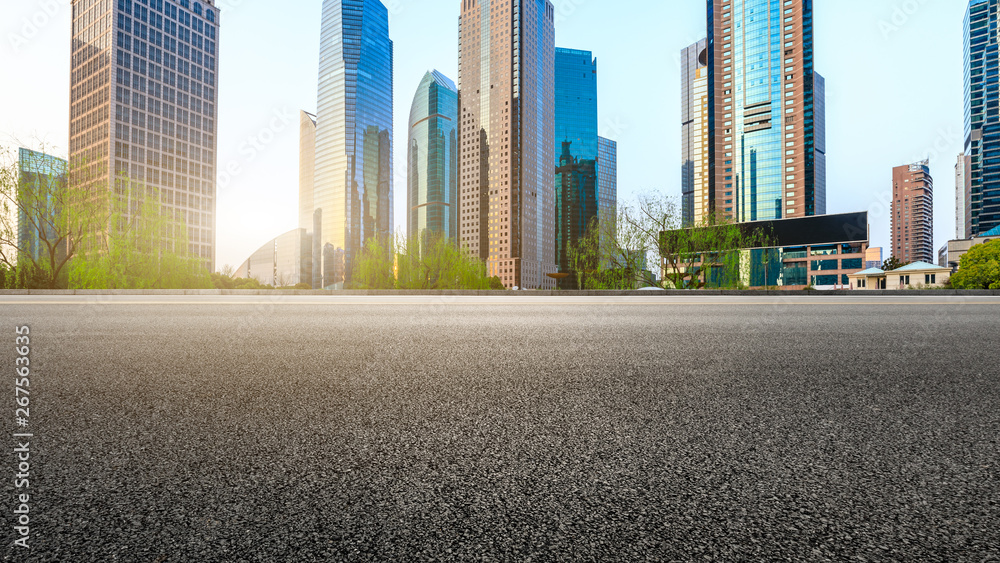 Shanghai modern commercial office buildings and empty asphalt highway