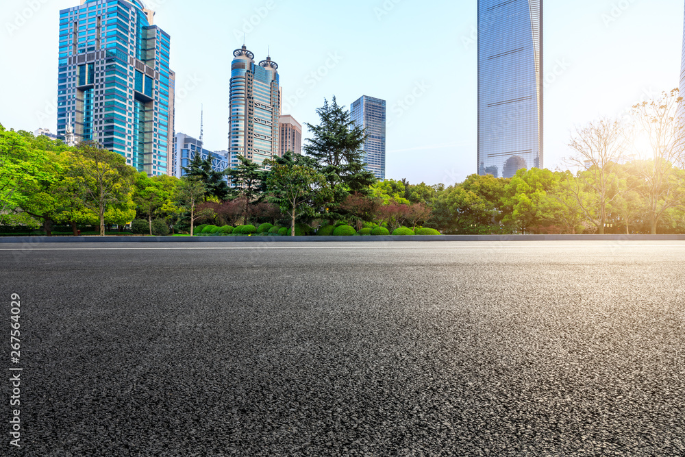 Shanghai modern commercial office buildings and empty asphalt highway