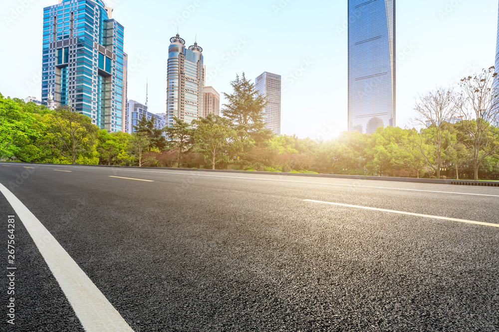 Shanghai modern commercial office buildings and empty asphalt highway