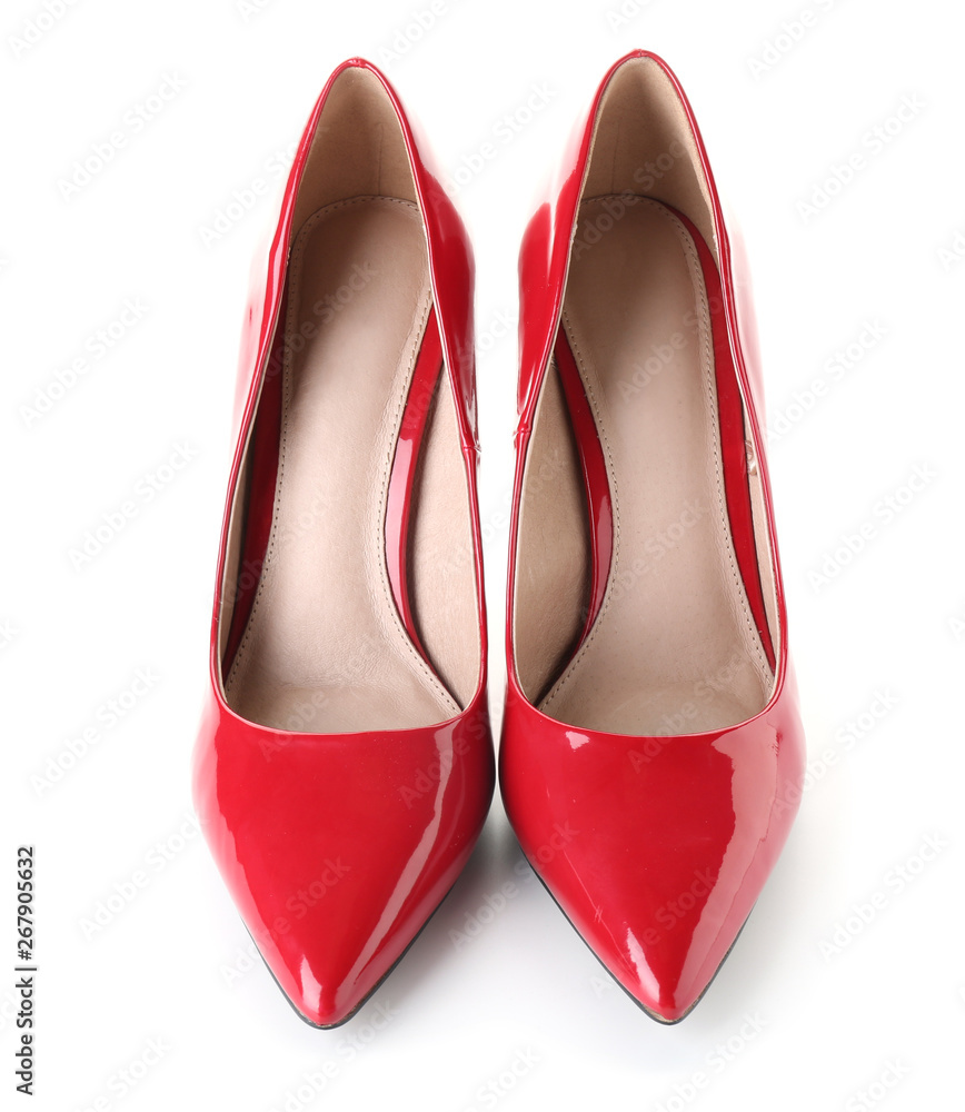 Pair of stylish female shoes on white background