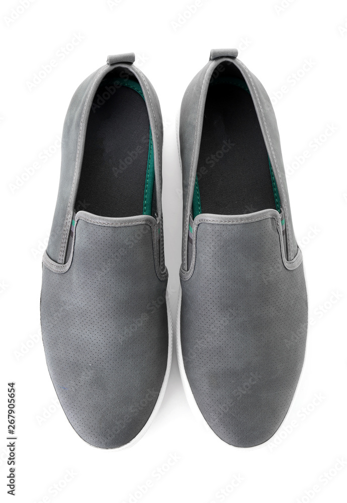 Pair of stylish casual shoes on white background