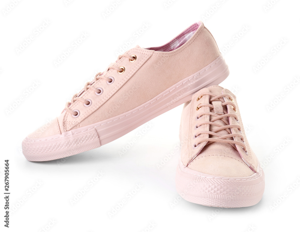 Pair of stylish casual shoes on white background