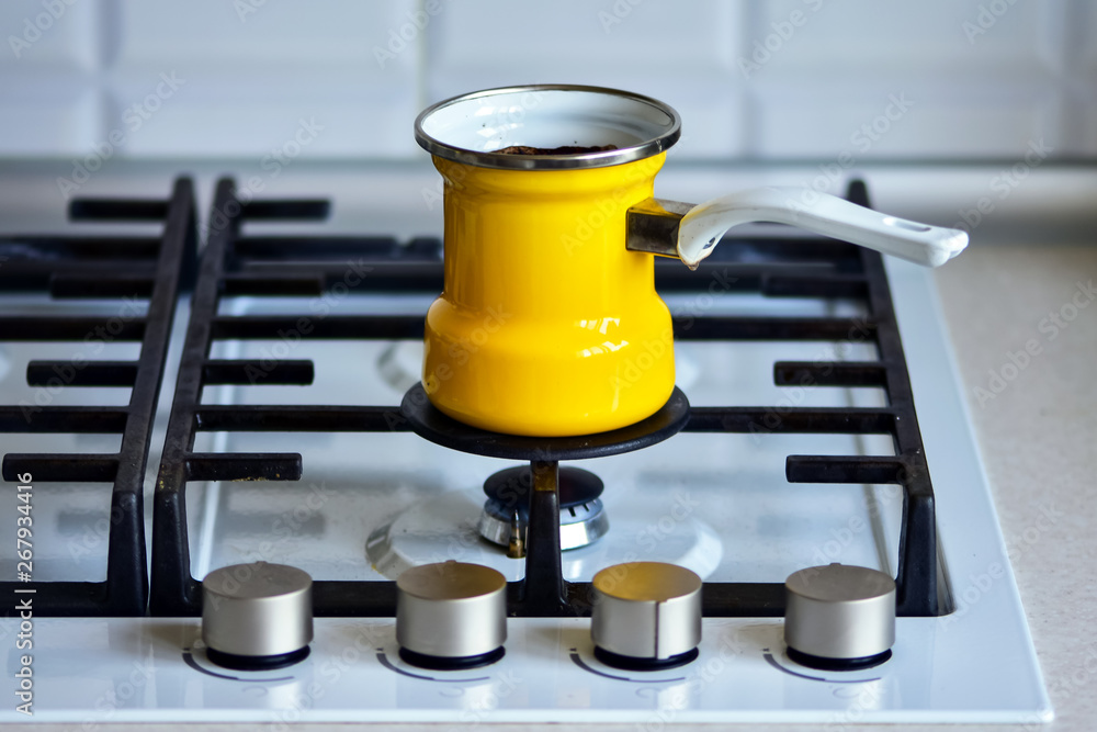 Close-up Turkish Coffee pot on a gas stove breakfast in the early morning