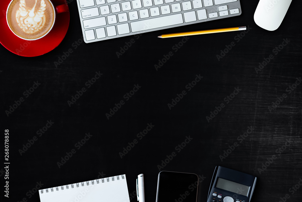 office stuff with tablet, laptop ,smartphone and coffee cup notepad and documents top view shot.