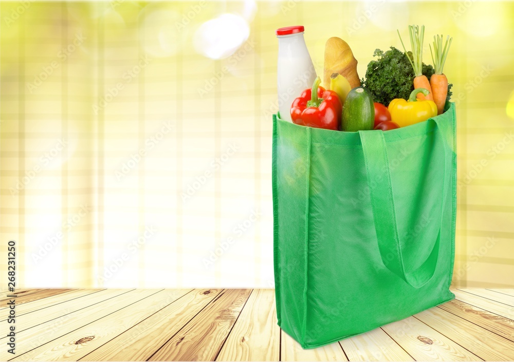 Full shopping  bag, isolated over  background