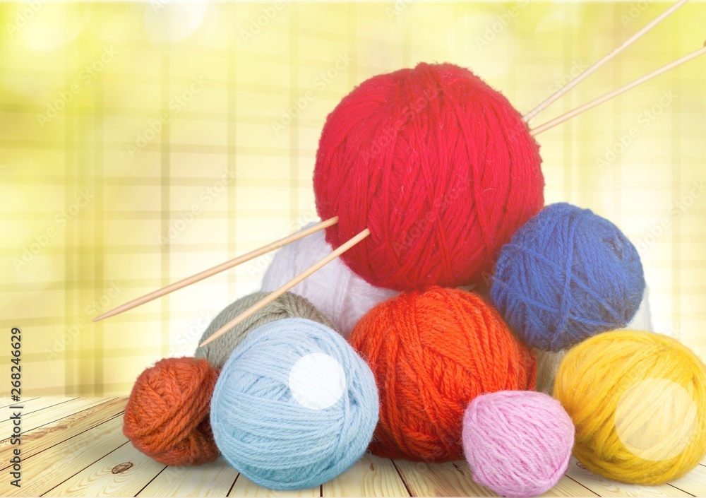 Close up of knitting wall balls on white background