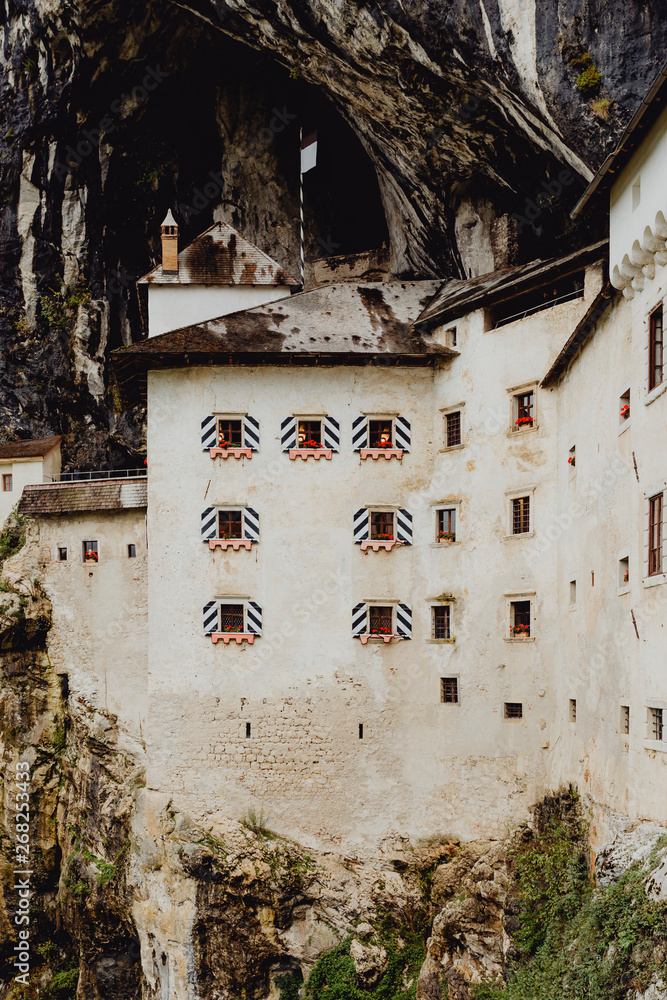 Renaissance castle by a cave