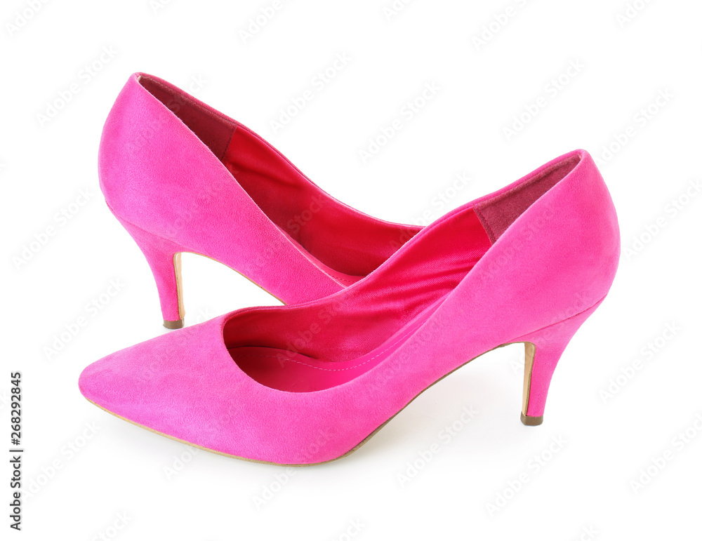 Pair of stylish female shoes on white background