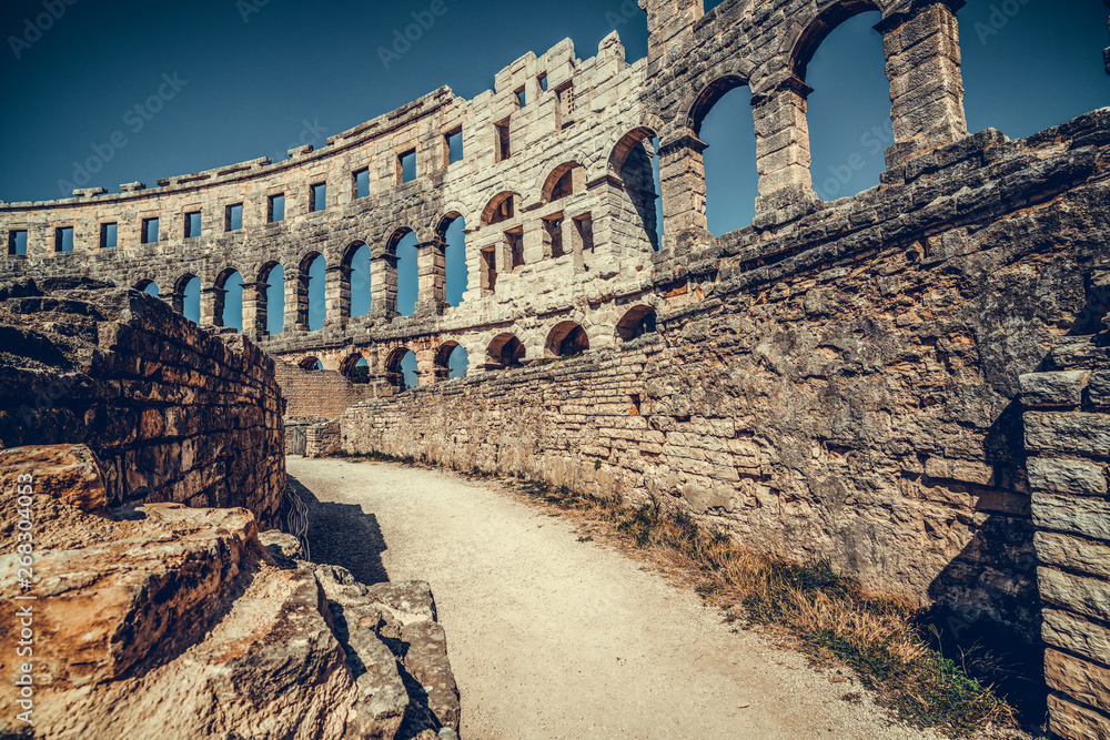 The Pula Arena is the famous Roman amphitheater in Pula, Istria, Croatia, Europe. It was constructed