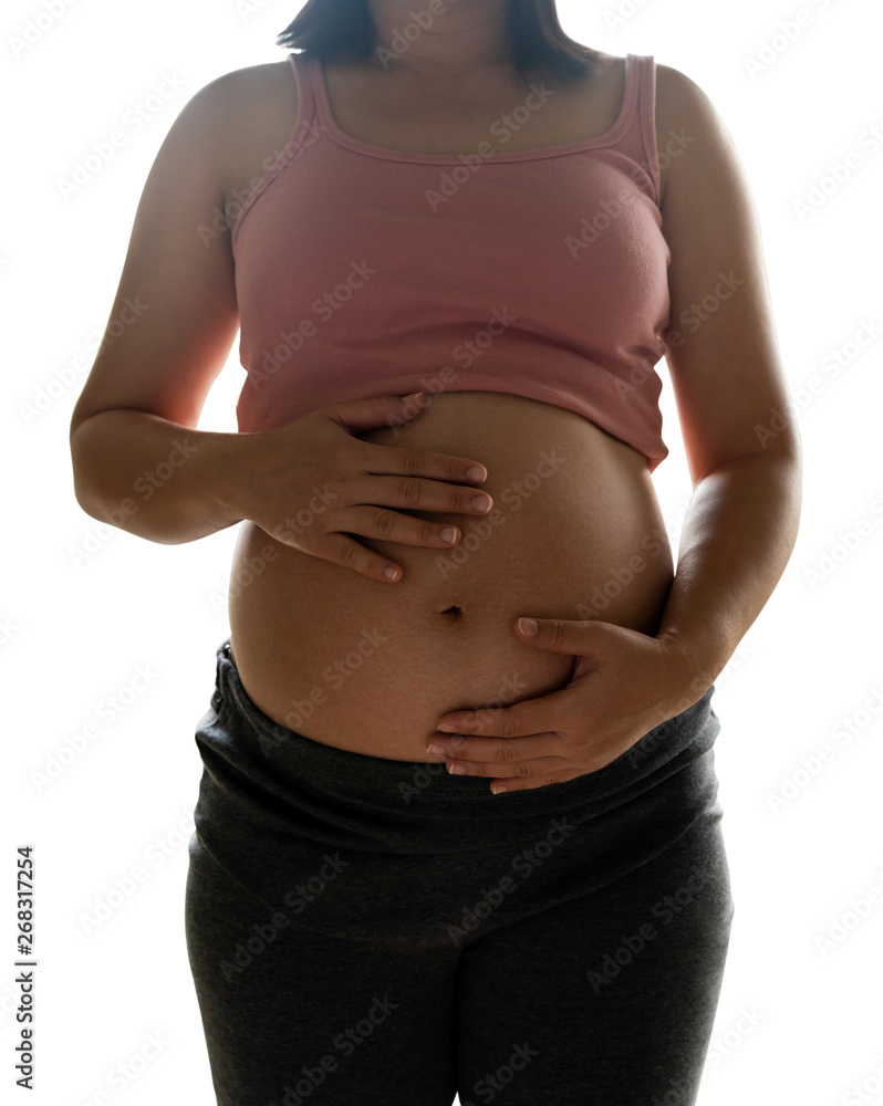 Happy pregnant woman taking care of her child isolated on white background. The young expecting moth