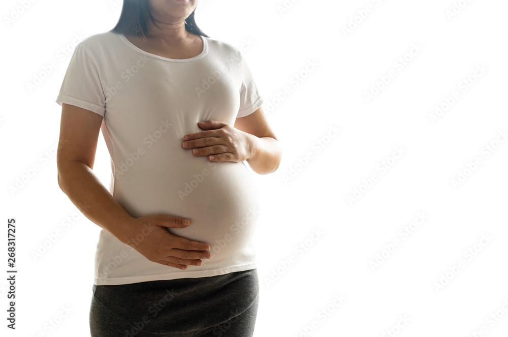 Happy pregnant woman taking care of her child isolated on white background. The young expecting moth