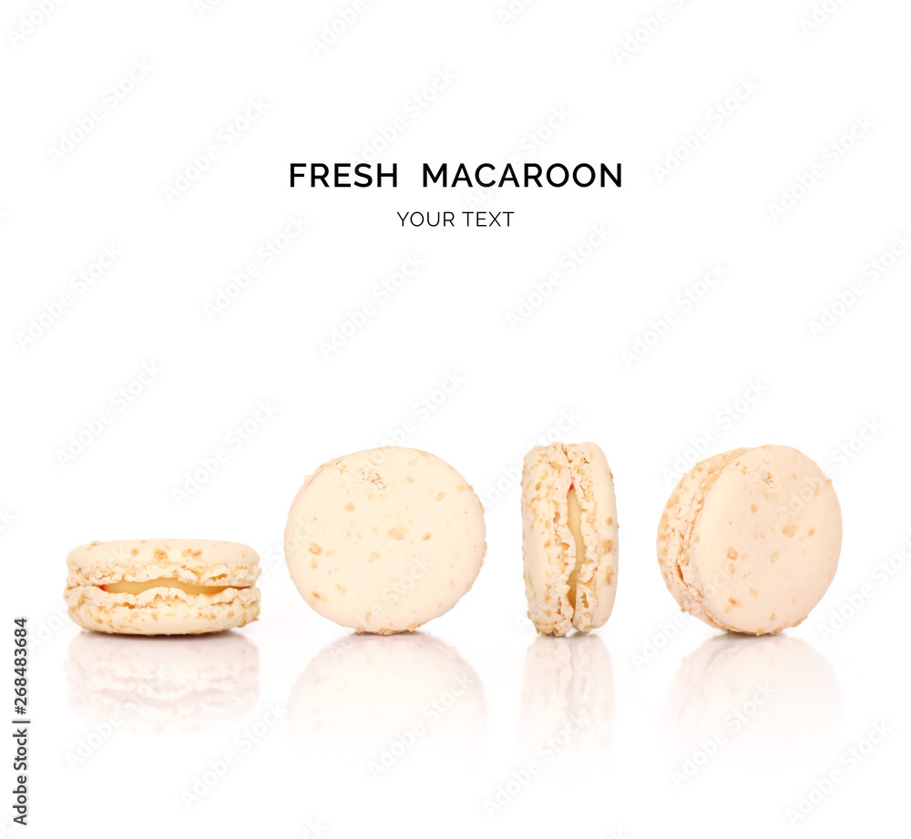 Creative layout made of white macaroons on the white background. Flat lay. Food concept. 