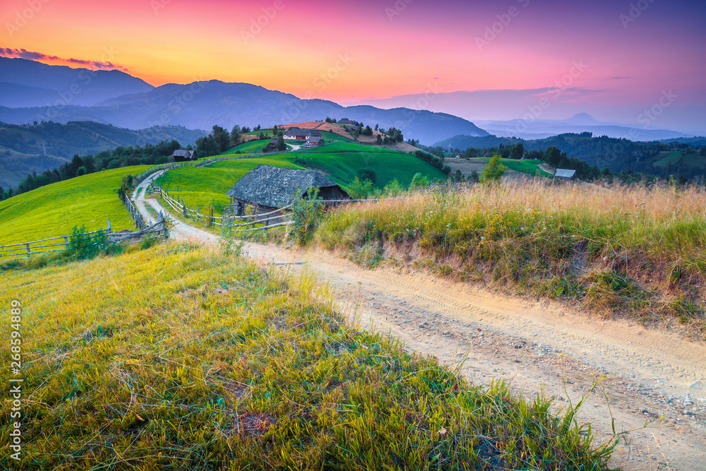 Beautiful summer rural landscape at sunset near Brasov, Transylvania, Romania