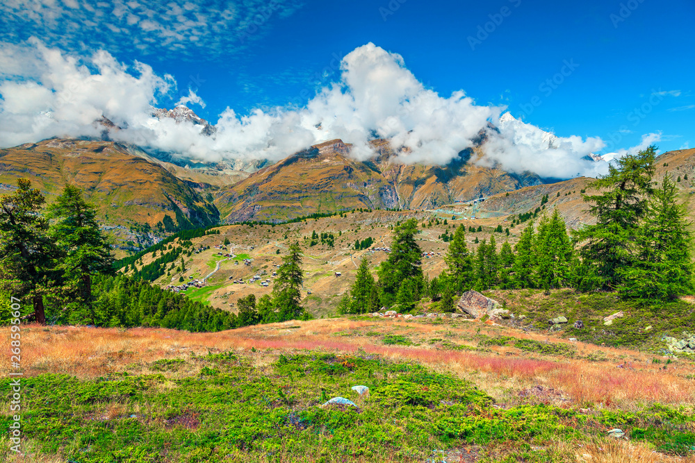 Fantastic alpine landscape with pasture and high mountains, Switzerland, Europe