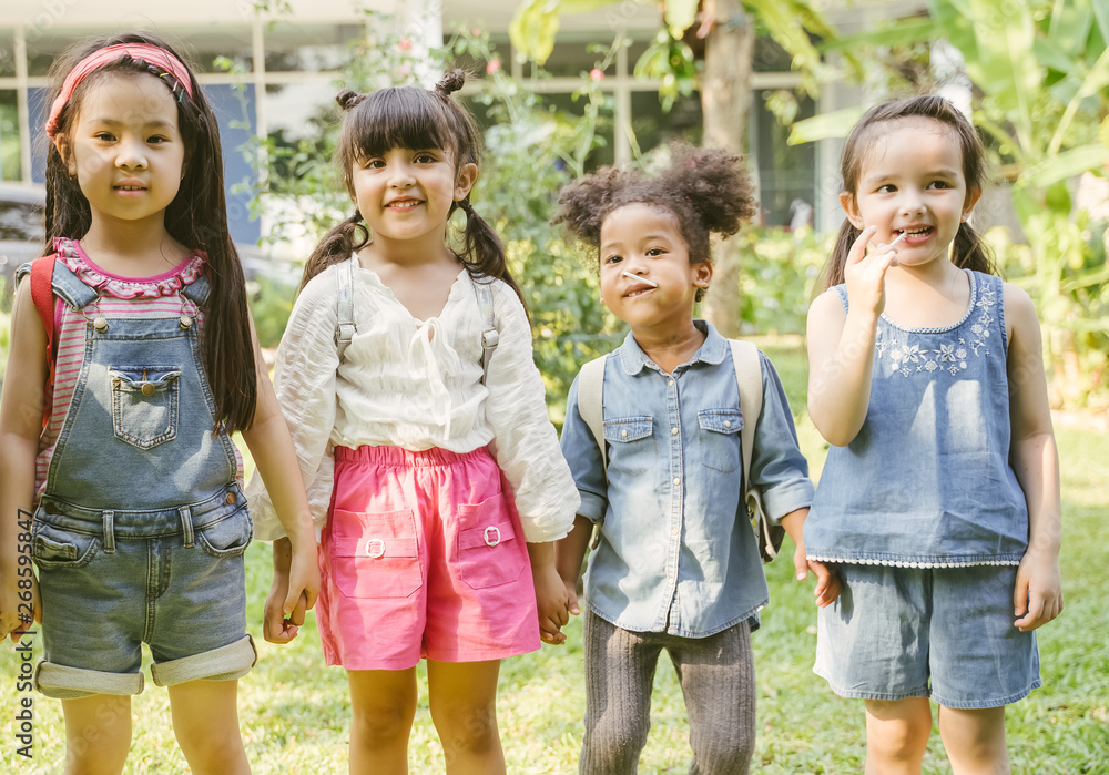 Portrait of kids with bag ready go to school students with backpacks.