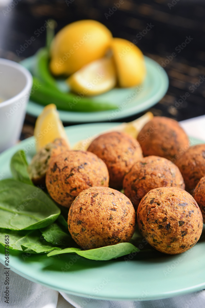 Tasty falafel balls on plate, closeup