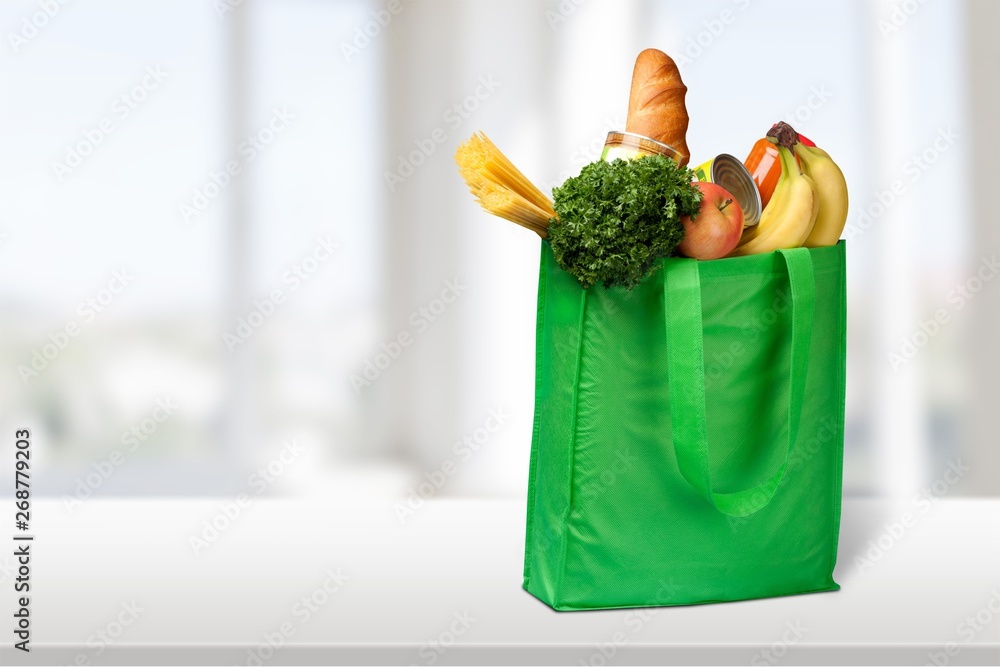 Full shopping  bag, isolated over  background