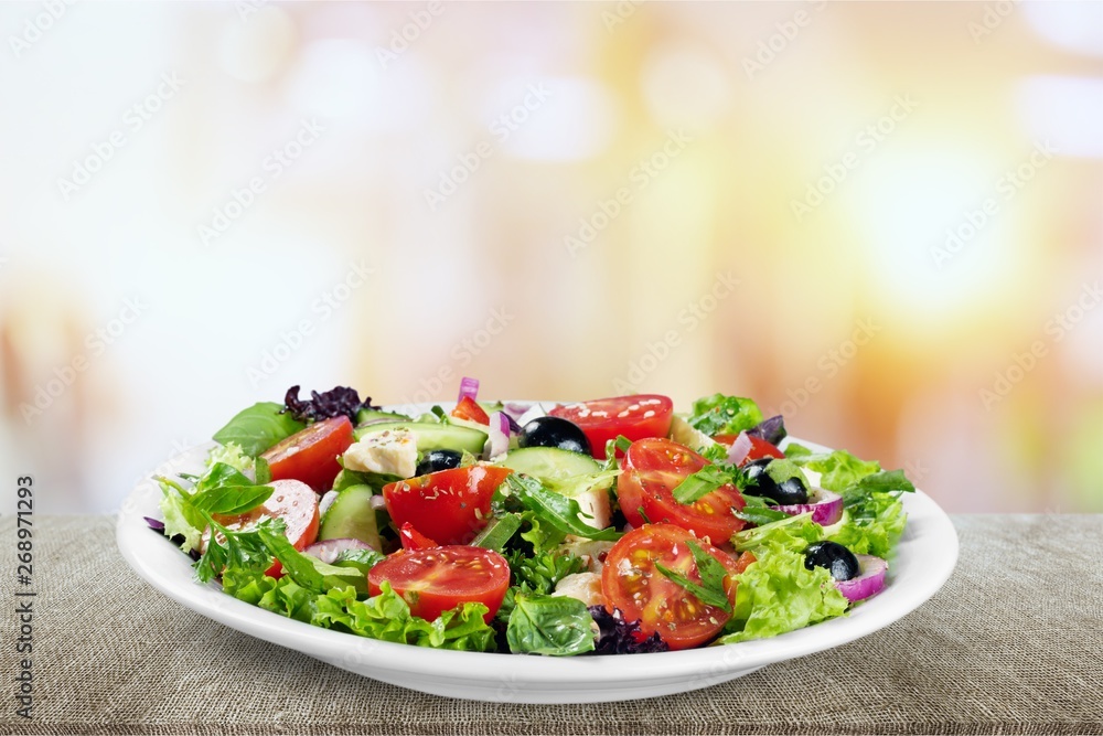 A plate of Greek salad on the kitchen table