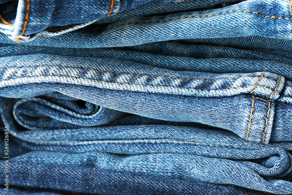 Stack of jeans clothes, closeup