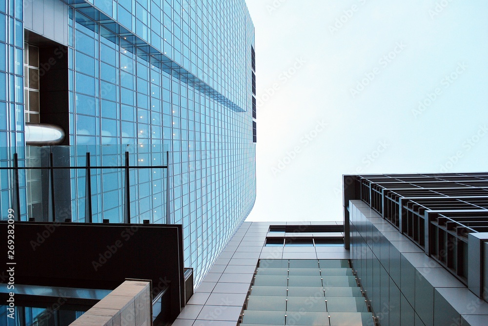 modern building with blue sky and clouds