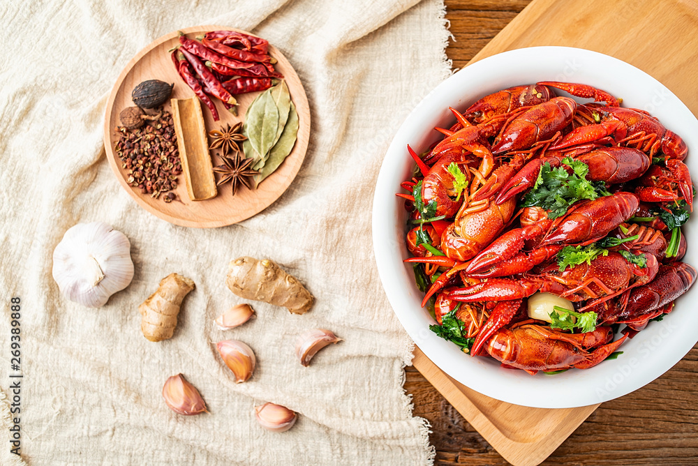 Chinese dish with a bowl of bright red delicious spicy crayfish