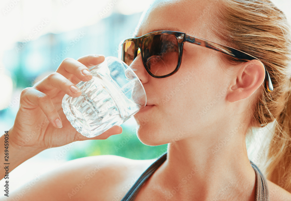 Sports woman drink water, fitness summer