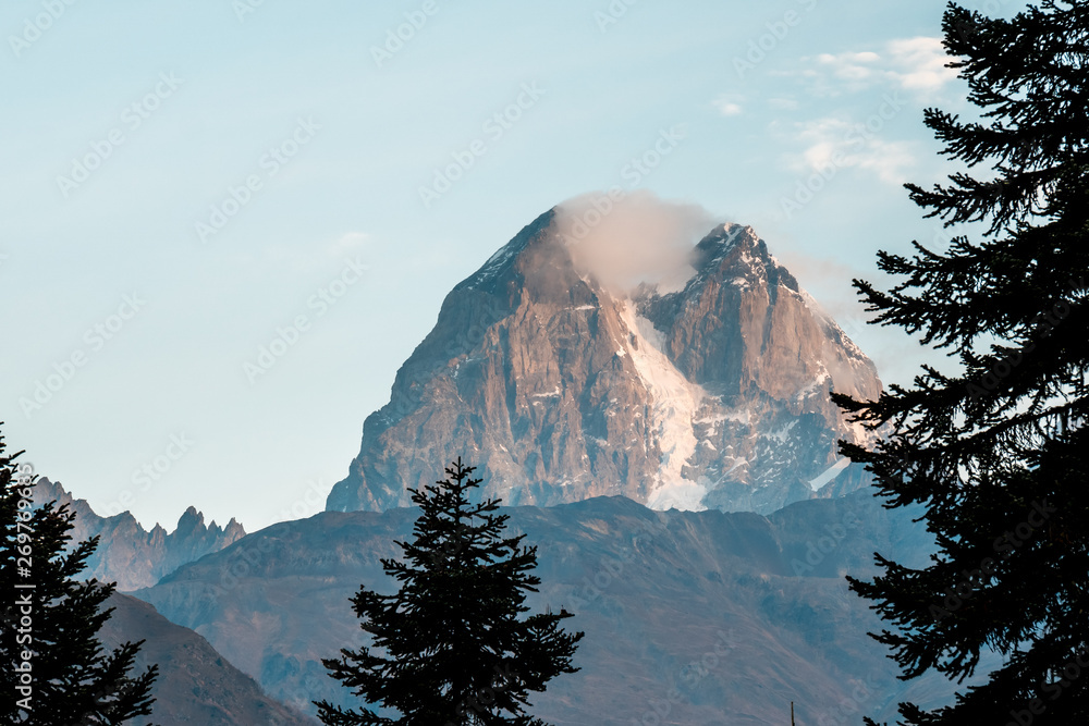 View of Mount Ushba. Ushba is one of the most notable peaks of the Caucasus range, located in the Sv