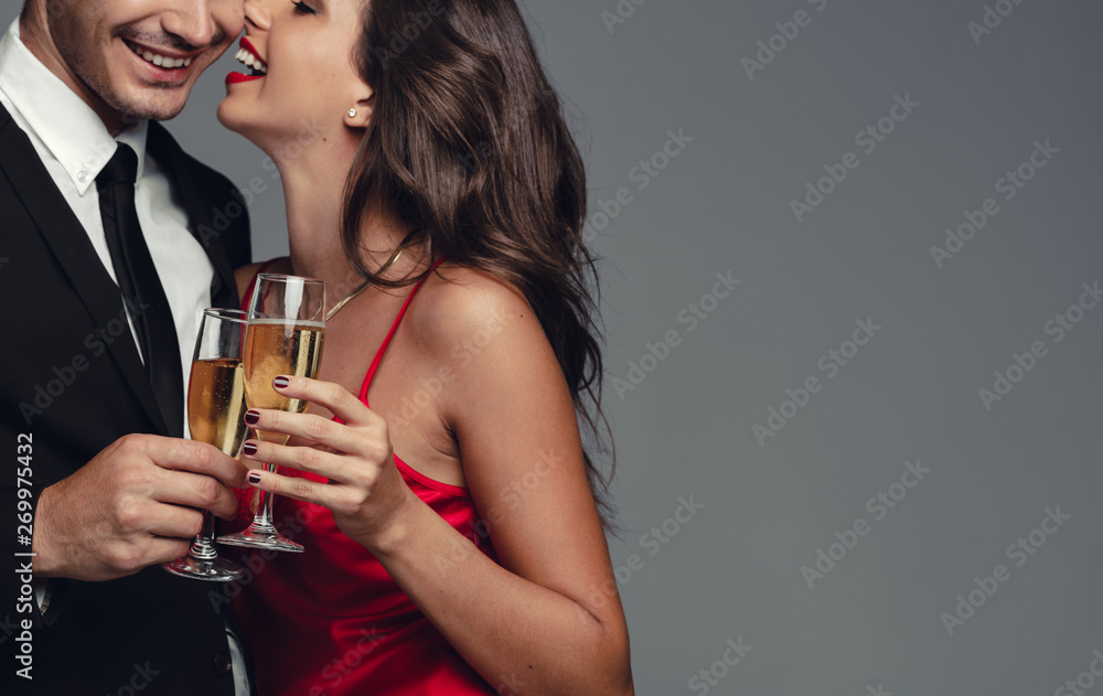 Romantic couple celebrating with champagne