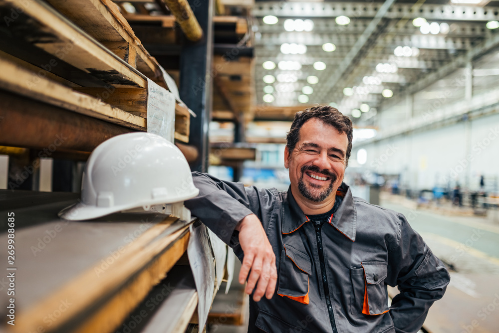 Portrait of a smiling mature industrial worker.