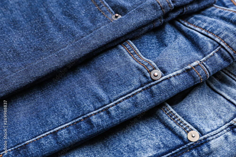 Different stylish jeans, closeup view