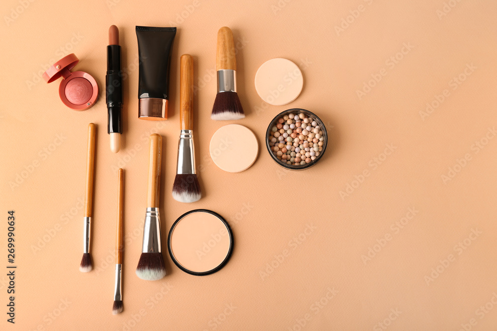 Set of cosmetics for contouring makeup on color background