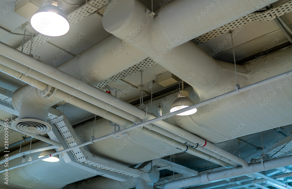 Air duct, wiring and plumbing in the mall. Air conditioner pipe, wiring pipe, and plumbing pipe syst