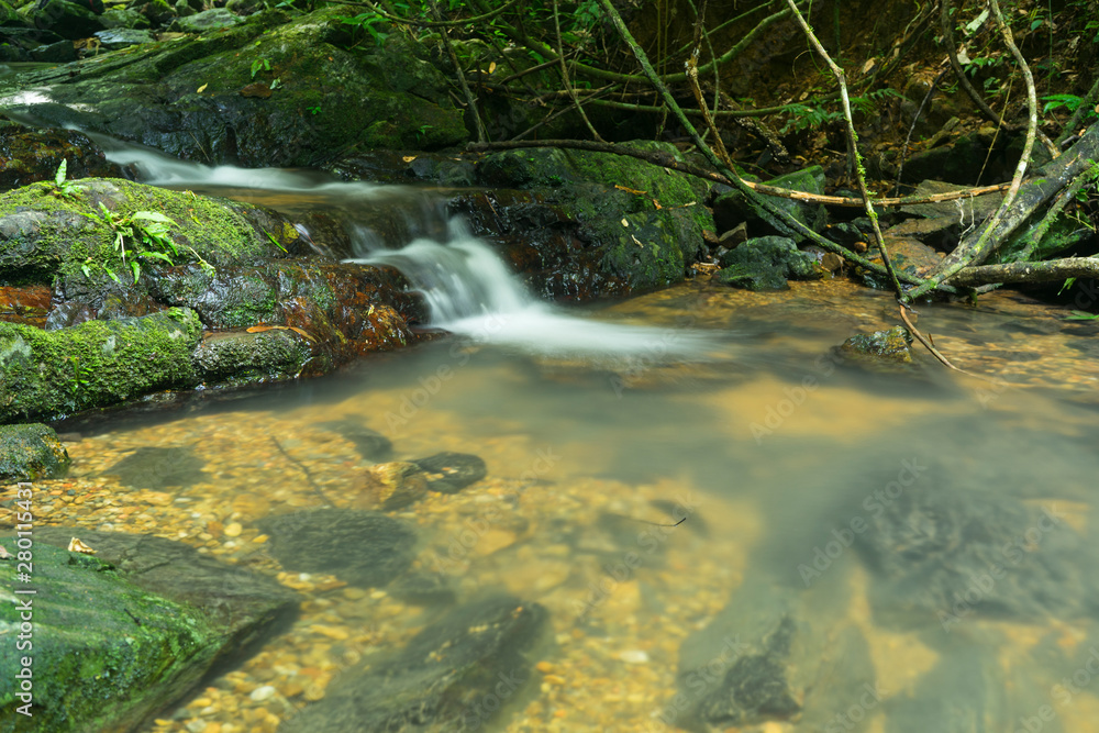 A beautiful waterfall and stream in rainy season inThailand.