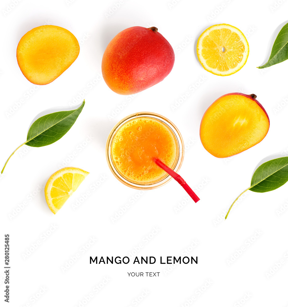 Creative layout made of mango smoothie. Flat lay. Food concept. Mango and lemon on the white backgro