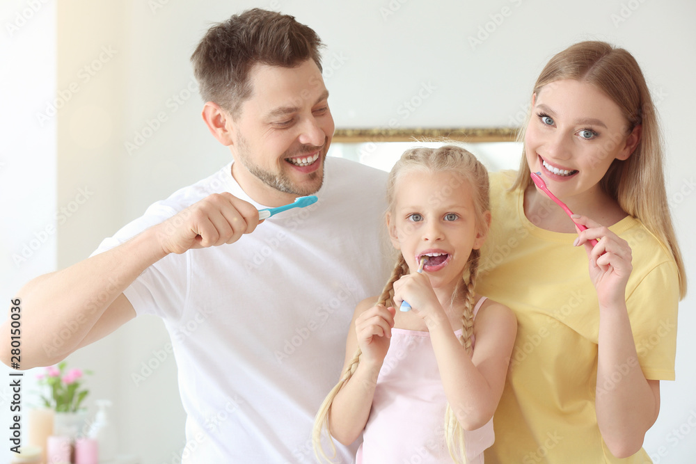 Family cleaning teeth at home