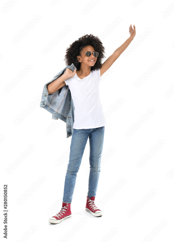 Stylish African-American girl in jeans clothes on white background