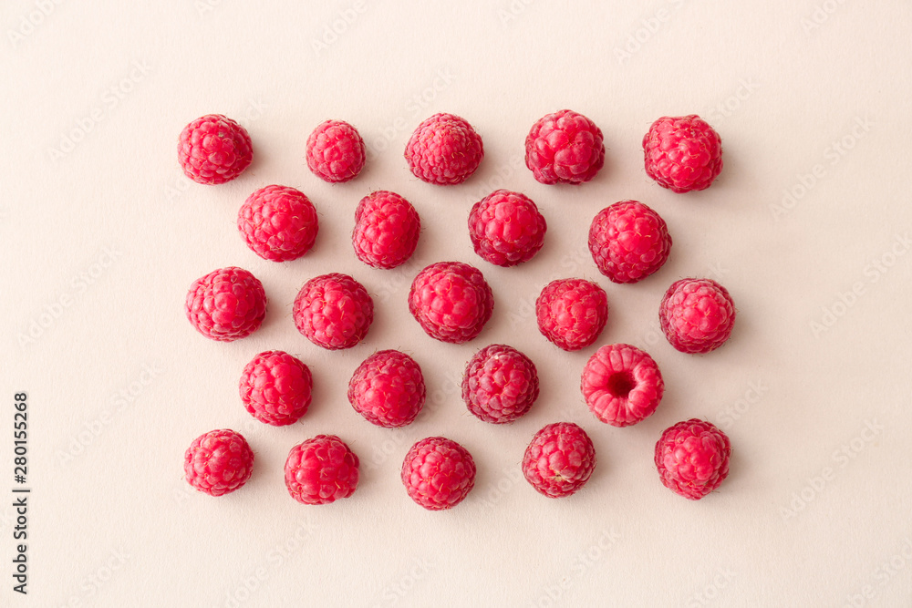 Sweet ripe raspberry on light background