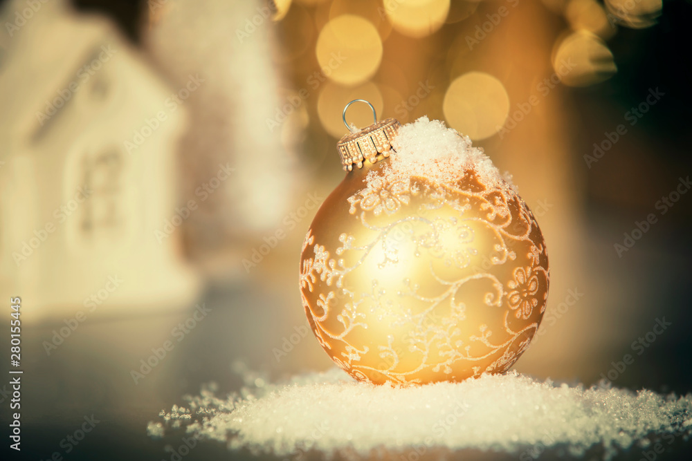 Christmas decoration on abstract gold background, close up