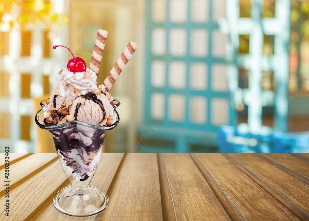 Tasty ,sweet Ice Cream  in cup on background