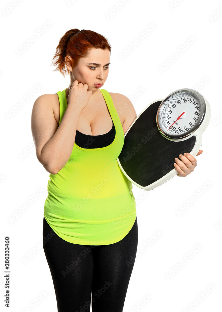 Overweight woman with scales on white background. Weight loss concept