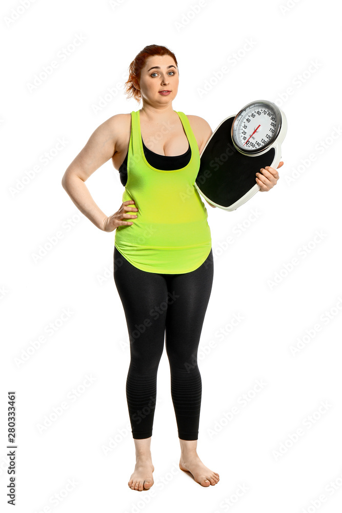 Overweight woman with scales on white background. Weight loss concept