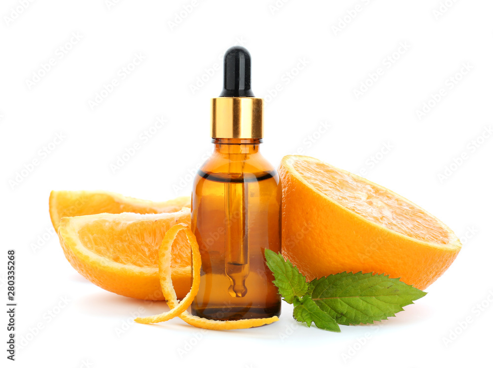 Citrus essential oil on white background